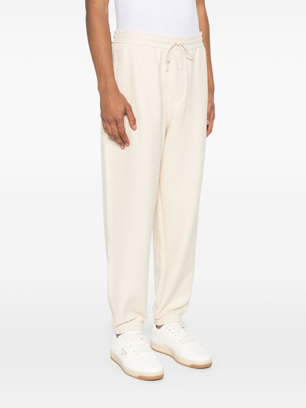 Emporio Armani ASV Lyocell blend jersey joggers with all-over lettering