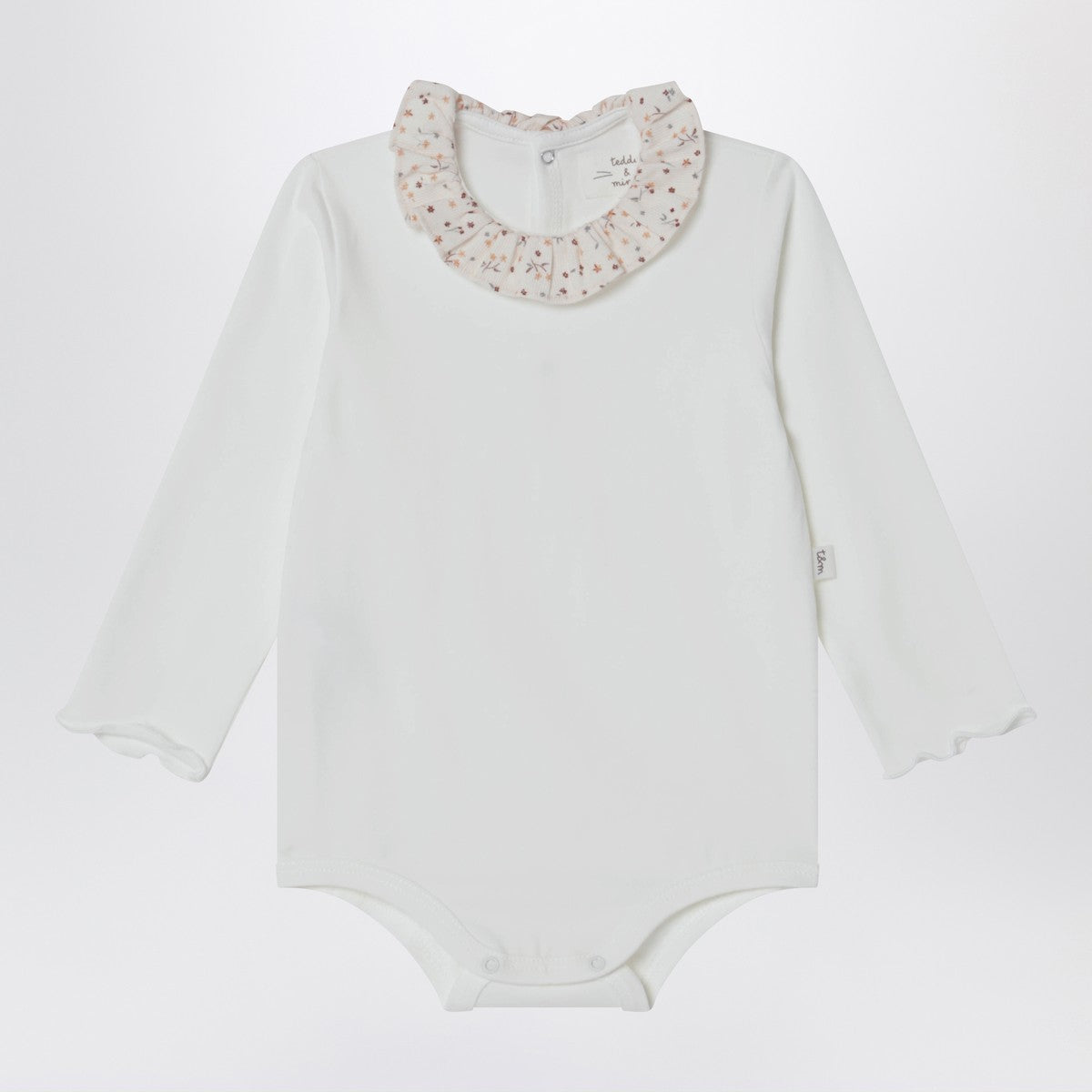 Teddy & Minou White bodysuit with neckline and floral print