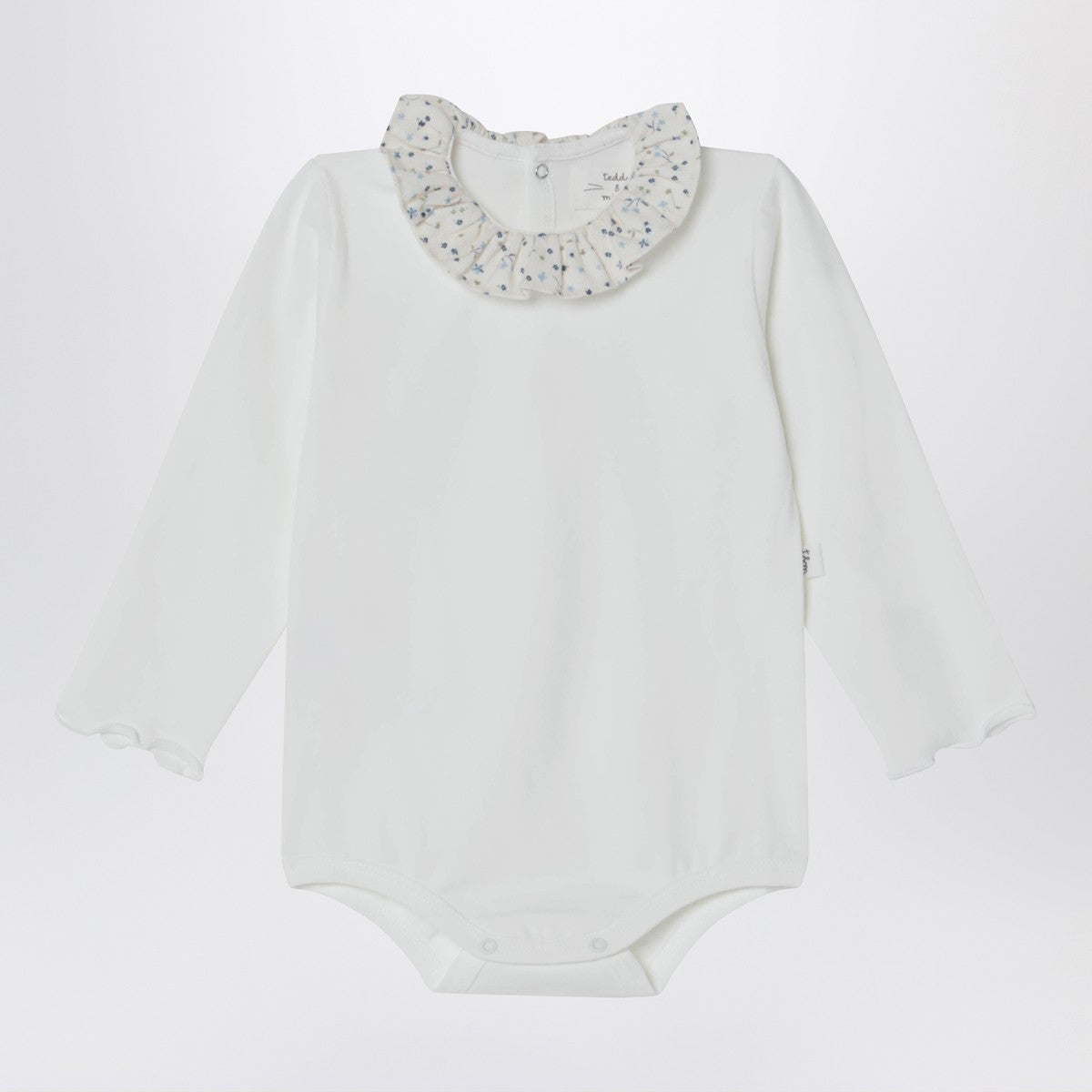 Teddy & Minou White bodysuit with neckline and floral print