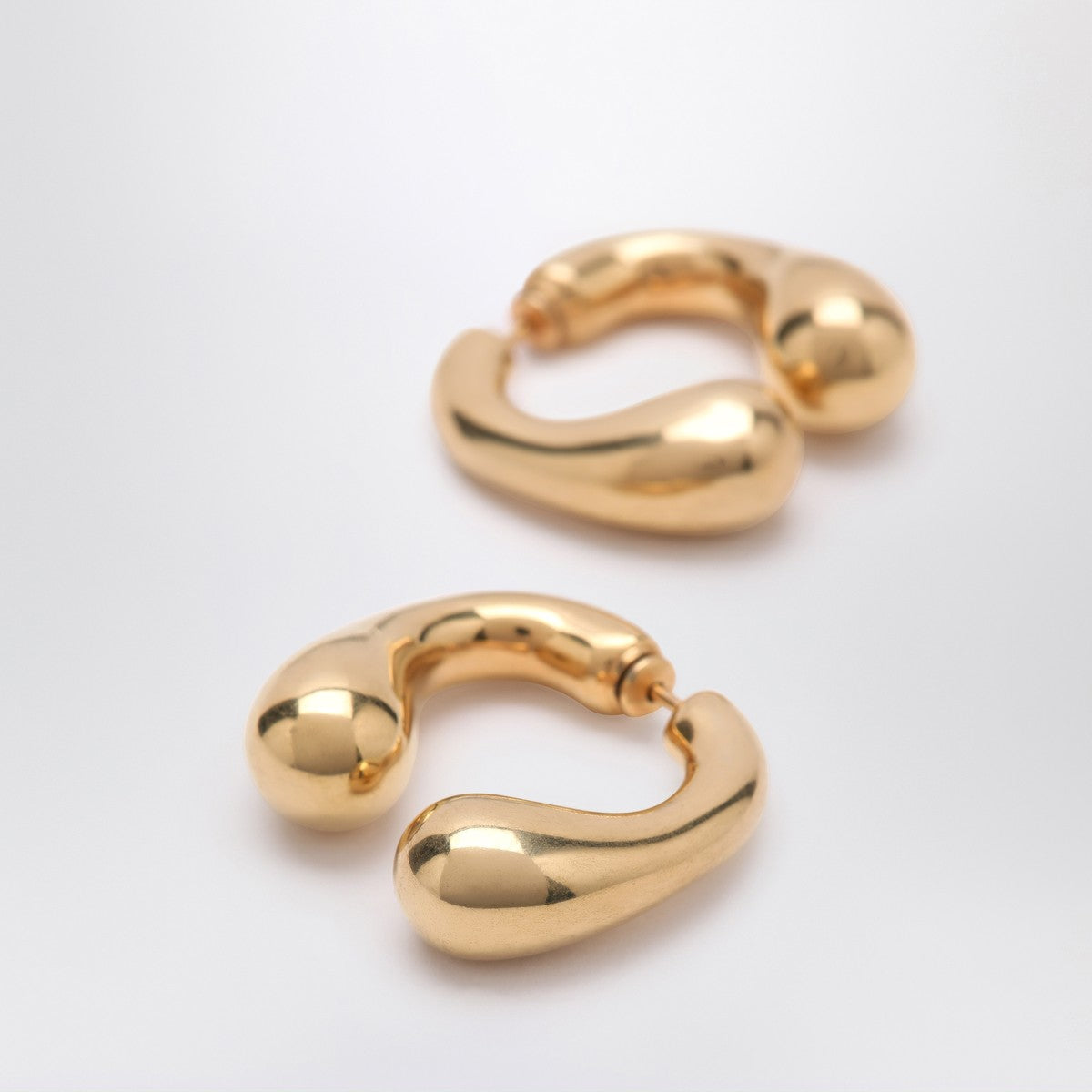 Panconesi P Helix gold earrings