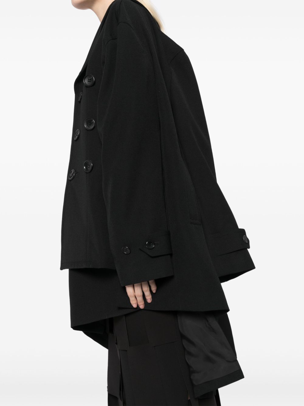 Comme Des Garcons Complete with asymmetrical sleeves