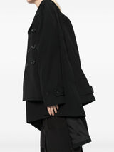 Comme Des Garcons Complete with asymmetrical sleeves