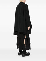 Comme Des Garcons Complete with asymmetrical sleeves