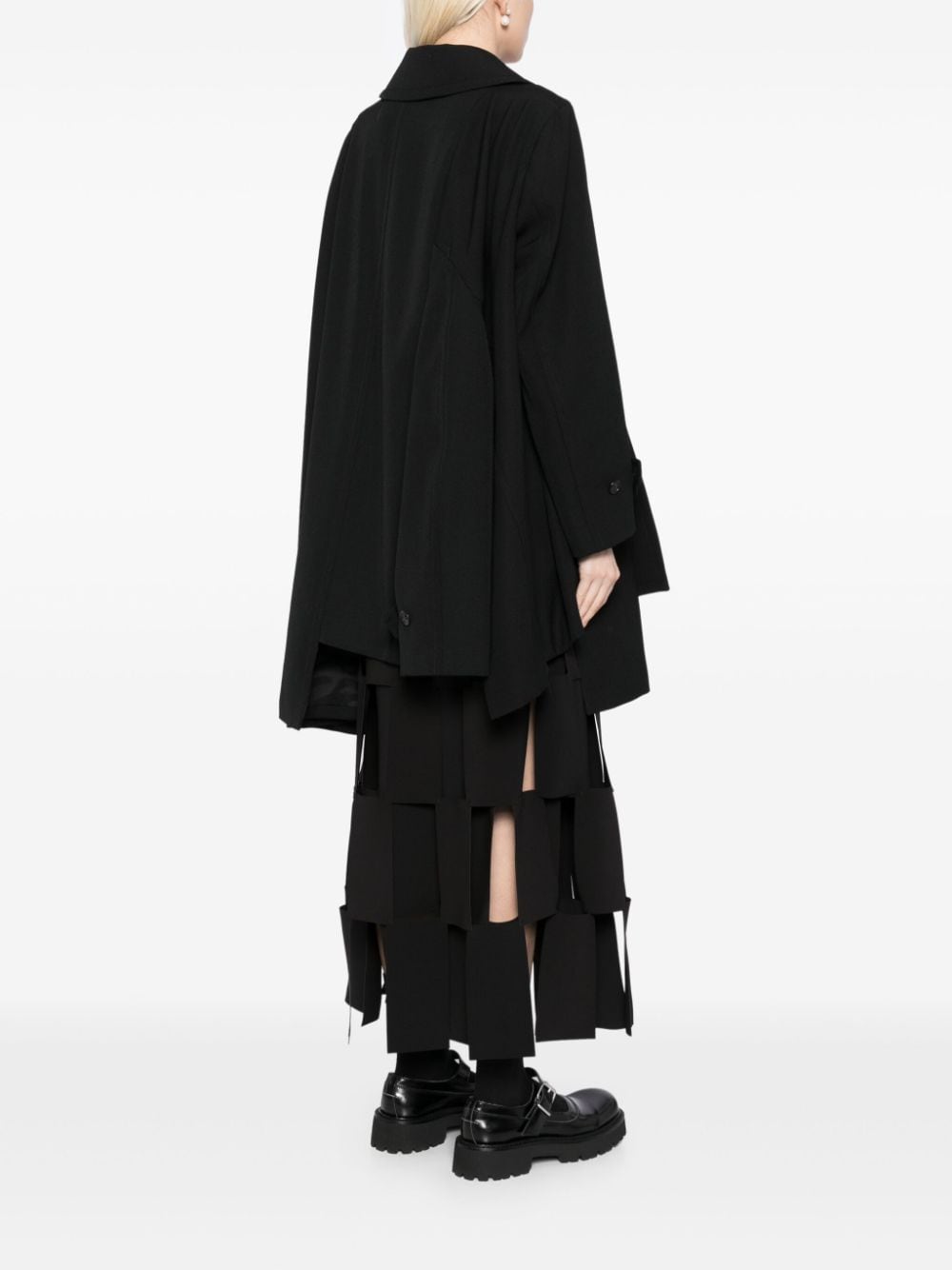Comme Des Garcons Complete with asymmetrical sleeves