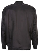 Comme Des Garcons Reversible asymmetric bomber jacket.
