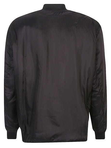 Comme Des Garcons Reversible asymmetric bomber jacket.
