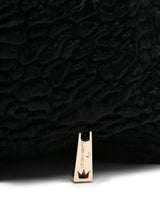 La Milanesa Textured triangular shoulder bag