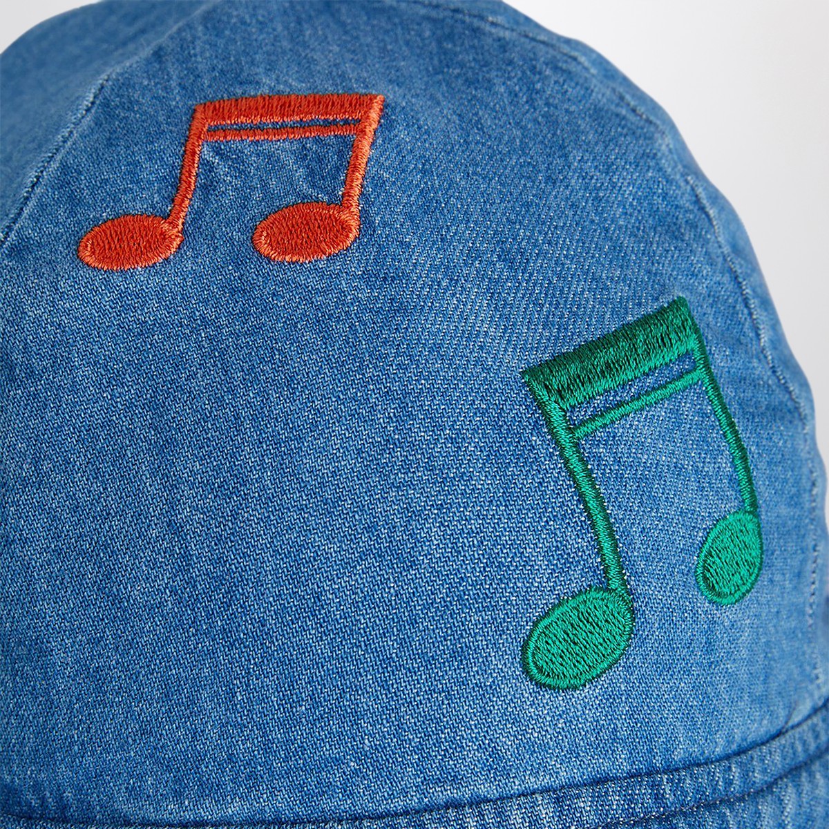 Mini Rodini Light blue denim hat with musical notes