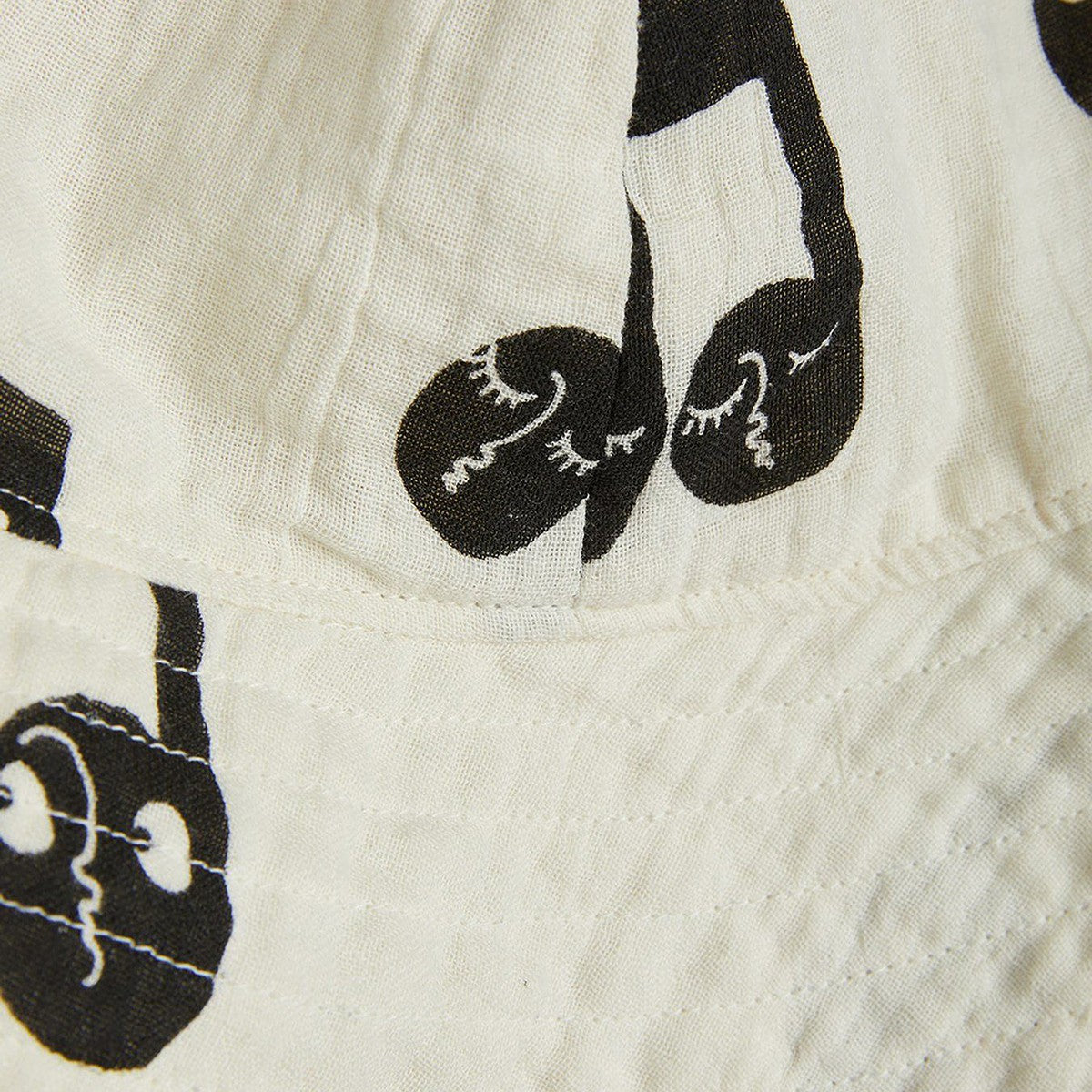 Mini Rodini White hat with musical notes