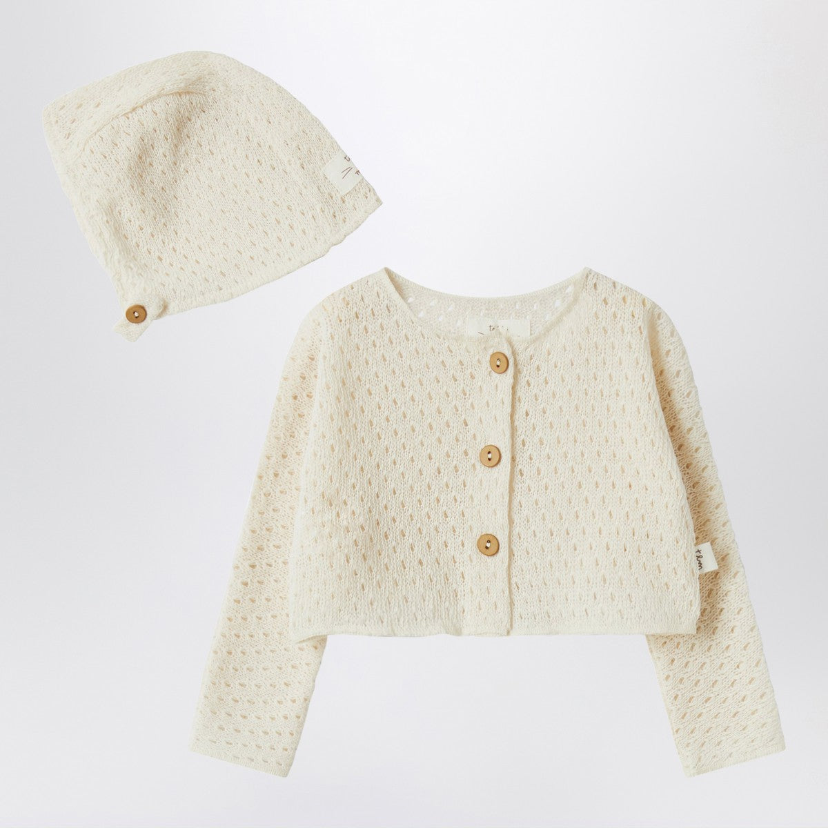 Teddy & Minou Cream-colored cardigan and hat in openwork knit